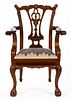 CHIPPENDALE-STYLE CARVED MAHOGANY CHILD'S ARMCHAIR