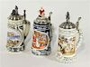 A Group of Three Commemorative Steins Height of tallest 10 inches.