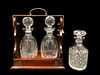 Oak and Brass Tantalus with Three Crystal Decanters 