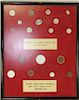 A Framed Case of Porcelain Coins 16 inches x 13 inches.