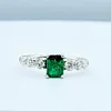Stunning Emerald and Graduated Diamond Ring