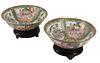 (2) CHINESE ROSE CANTON BOWLS ON WOOD STANDS