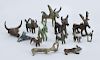 MISCELLANEOUS GROUP OF THIRTEEN ANCIENT BRONZE AND METAL STAG AND ANIMAL FORM PENDANTS