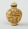 CHINESE METAL-MOUNTED CARVED COMPOSITION SNUFF BOTTLE AND STOPPER