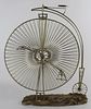 Vintage high wheel bicycle sculpture