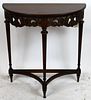 Vintage American demi-lune console with carved apron