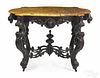 Victorian marble top console table, late 19th c., with a shaped turtle top, 30 1/2'' h., 42 1/2'' w.
