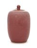 * A Small Peachbloom Glazed Porcelain Covered Jar Height 4 7/8 inches.