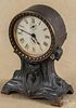 Oak gingerbread clock, ca. 1900, 24'' h., together with a Seth Thomas alarm clock with a bronzed case