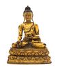 A Sino-Tibetan Gilt Bronze Figure of Medicine Buddha Height 9 1/2 inches.