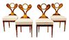 A Group of Four Biedermeier Figured Walnut Side Chairs Height 35 1/2 inches.