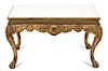 An Italian Louis XV Style Giltwood Carved Low Table Height 18 x width 31 1/2 x depth 31 1/2 inches.
