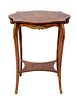 A Louis XV Style Marquetry Occasional Table Height 29 1/2 x width 23 x depth 17 3/4 inches.