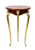 A Louis XVI Style Mahogany Top Occasional Side Table Height 31 x diameter 19 3/4 inches.