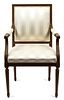 A Louis XVI Style Walnut Framed Fauteuil Height 38 1/2 inches.