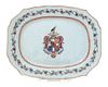 An English Lowestoft Armorial Platter Length 13 1/4 inches.
