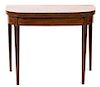 A George III Style Inlaid Mahogany Flip Top Table Height 29 x width 35 3/4 x depth 17 1/2 inches (closed).