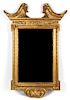 A Georgian Style Carved Giltwood Mirror 51 1/2 x 34 1/4 inches.