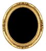 A Victorian Gilt Framed Oval Mirror 32 x 28 inches.