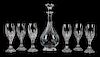 A Seven-Piece Baccarat Glass Cordial Set Height of decanter 9 1/4 inches.