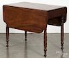 Sheraton mahogany drop leaf table, ca. 1825, with carved legs, 28 1/2'' h., 22'' w., 36'' d.