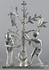 Folk art cut tin candelabra with figures of Adam and Eve, 19 1/4'' h.