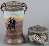 Nippon porcelain vase with cowboy decoration, 12'' h., together with a covered jar with playing cards