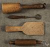 Group of woodenware, 19th c., to include a tiger maple masher, a small rolling pin, a carved butter