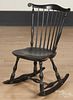 Fanback Windsor rocking chair, late 18th c., retaining an old black surface.