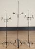 Three reproduction wrought iron candlestands, tallest - 69 1/4''.