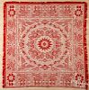 Red and white jacquard coverlet, 19th c., with eagle corners, 77'' x 70''.