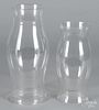 Two colorless glass hurricane shades, 11 1/4'' h. and 13 3/4'' h., together with a compote, 4 3/4'' h.