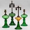 Group of Four Green Glass Fluid Lamps