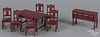 Eight pieces of Arcade red color doll house dining room furniture.