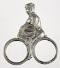 German silver-plated figural bicycle cigar cutter, 2'' h.