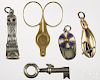 Five figural cigar cutters, to include a sterling silver owl, 1 3/4'' h., a key, a lobster claw