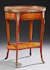 French Ormolu Mounted Marquetry Inlaid Mahogany Oval Marble Top Side Table, 19th c., the breche D'Alpes marble with a three-q