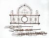 THREE ITALIAN WROUGHT-IRON TWO-PRONG MEAT FORKS AND A FIVE-HOOK HOLDER
