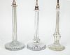 THREE SIMILAR VICTORIAN GLASS COLUMN-FORM TABLE LAMPS