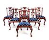 * A Set of Ten Chippendale Style Mahogany Dining Chairs Height 38 1/2 inches.