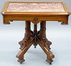 Victorian walnut marble top table with inset rouge marble top and skirt with triangle inlays.  height 29 1/2 inches, top: 23"