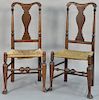 Pair of Queen Anne side chairs each with rush seats and bold turned stretchers set on turned legs ending in pad feet, circa 1