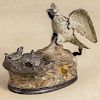 Cast iron Eagle and Eaglets mechanical bank, manufactured by J. & E. Stevens Co.