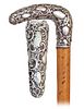 33. Silver Day Dane -Ca. 1890 -L-shaped silver handle modeled with pleasing rounded edges in a rich Baroque taste with dense 