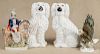 Large pair of Staffordshire spaniels, 19th c., 14 1/2'' h., together with a Staffordshire figure