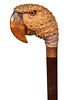 142. Carved Parrot Cane- Ca. 1920- A realistic, carved parrot head with two color glass eyes, horn collar, hardwood shaft and