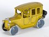 Dent cast iron cab with painted driver, having embossed 543 license plate, 8'' l.