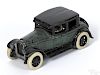 Arcade cast iron Buick sedan with a nickel-plated driver, 8 1/4'' l.