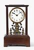 A good early 20th century Eureka four glass mantel clock