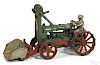 Scarce Hubley cast iron tractor with a front scoop and a nickel-plated driver, 9 1/4'' l.